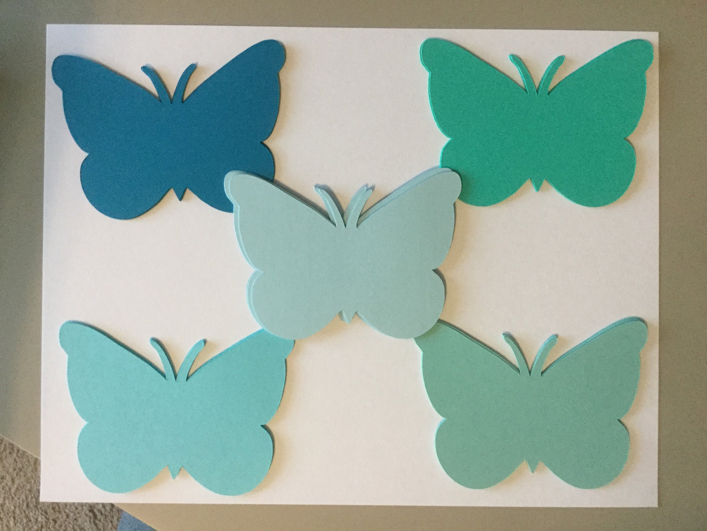 Shop 25 blue and green butterfly die cuts made from quality cardstock. Perfect for scrapbooking, classroom crafts, baby showers, card making, spring decorations, and DIY projects.